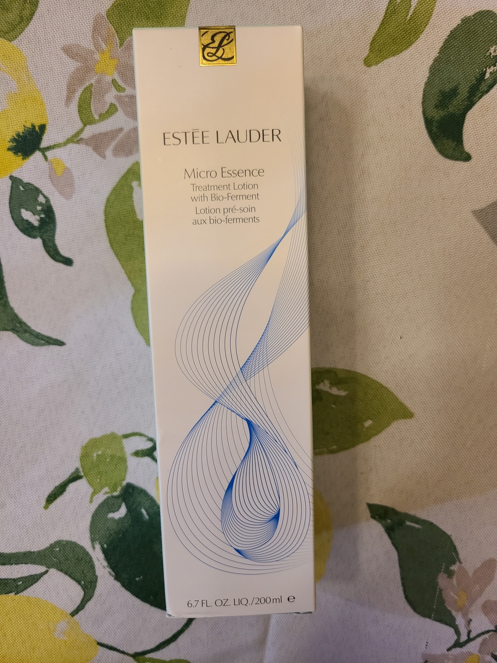Estee Lauder Micro Essence Treatment Lotion – White with Blue Accents